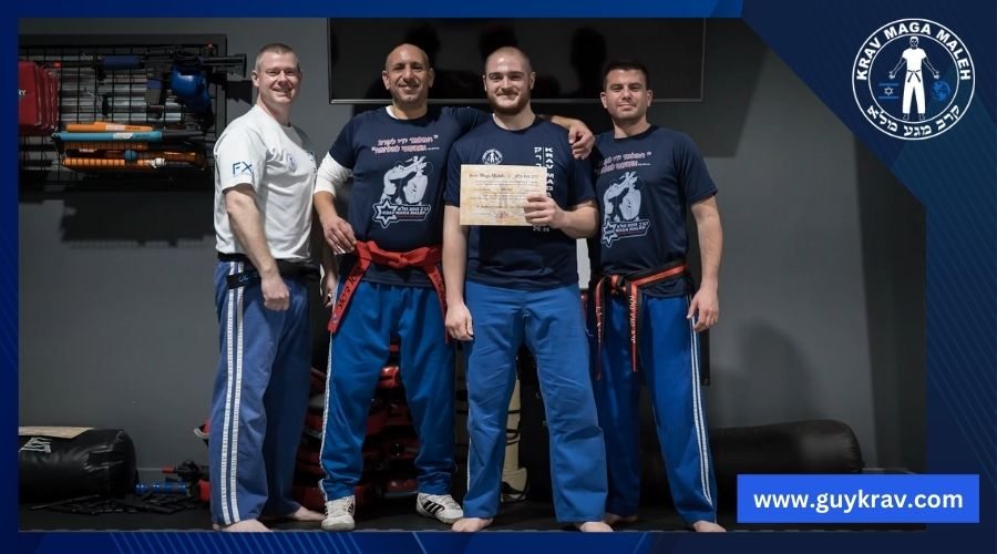 Guy Krav with martial art certification awarded to student